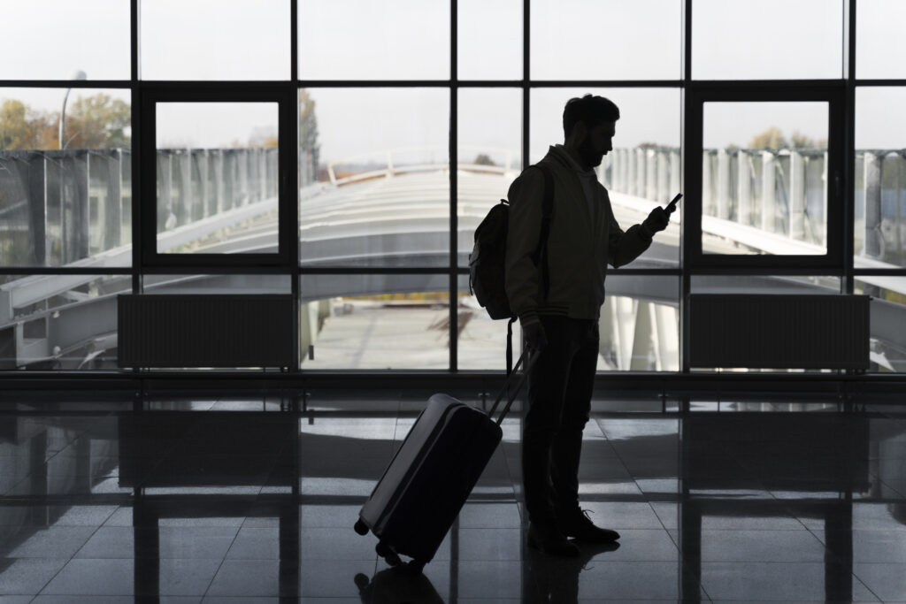 Man traveling on return flight